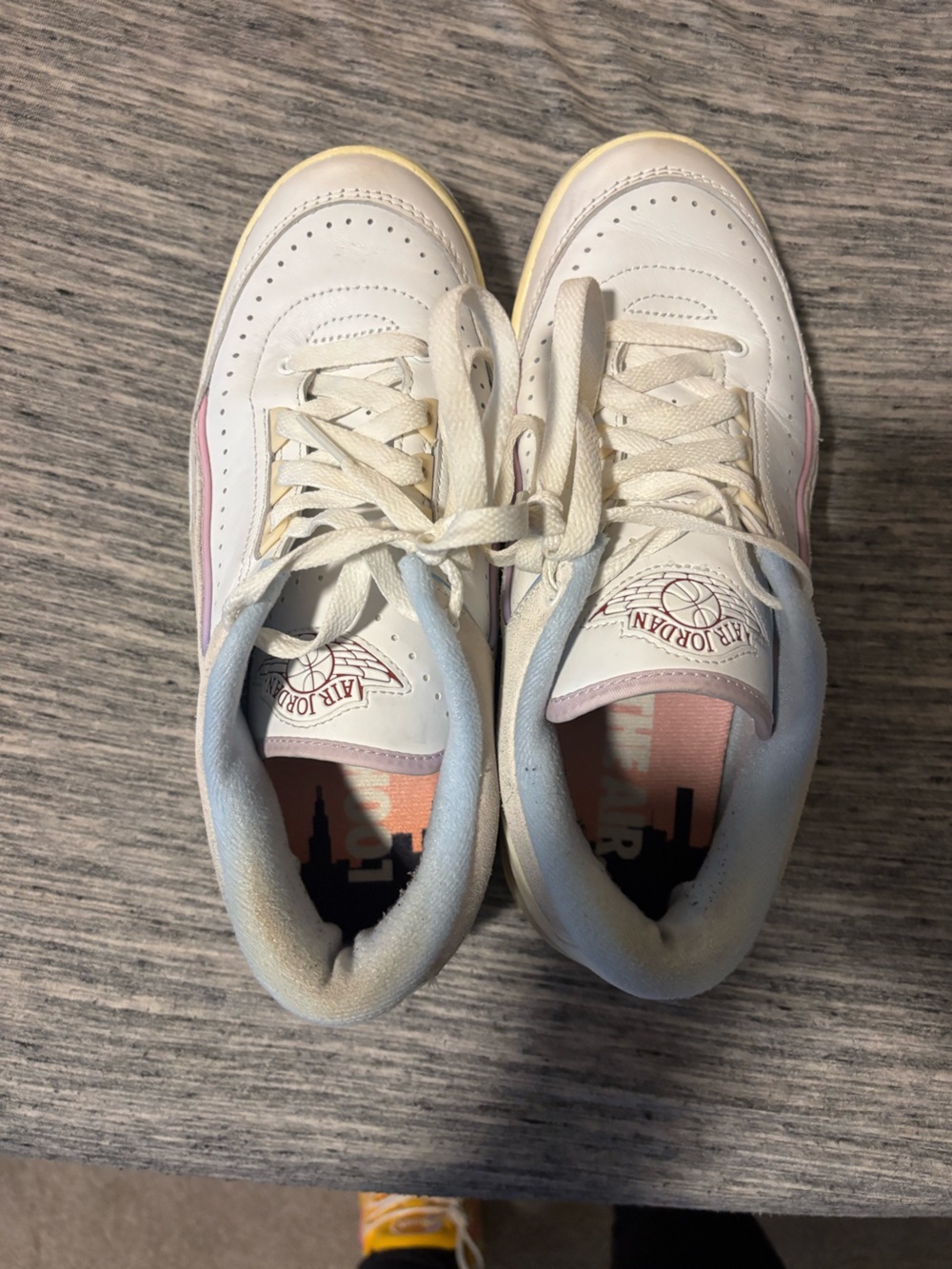 Jordan Women’s Sneakers in White with Pink and Light Blue Accents